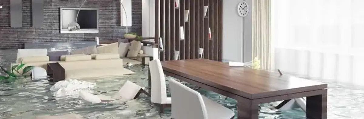 home interior affected by water damage with flooded floors and displaced furniture in Minneapolis, MN